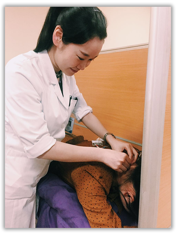 HEALING THERAPIES - doctor xiaoxi treating patient with acupuncture